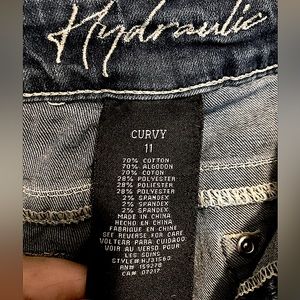 Size 11 fits like 12. Ripped jeans with distressed bottoms